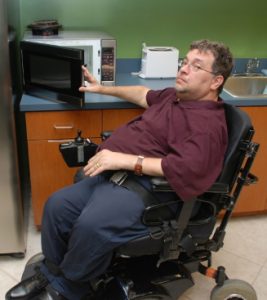 Man in wheelchair Ralph: Hangs on to Medicaid and SSI